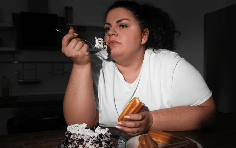 Consuming High-Calorie or High-Sugar Foods at Night